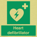 green-background-with-white-text-and-heart-defibrillator-symbol--white-cross-and~